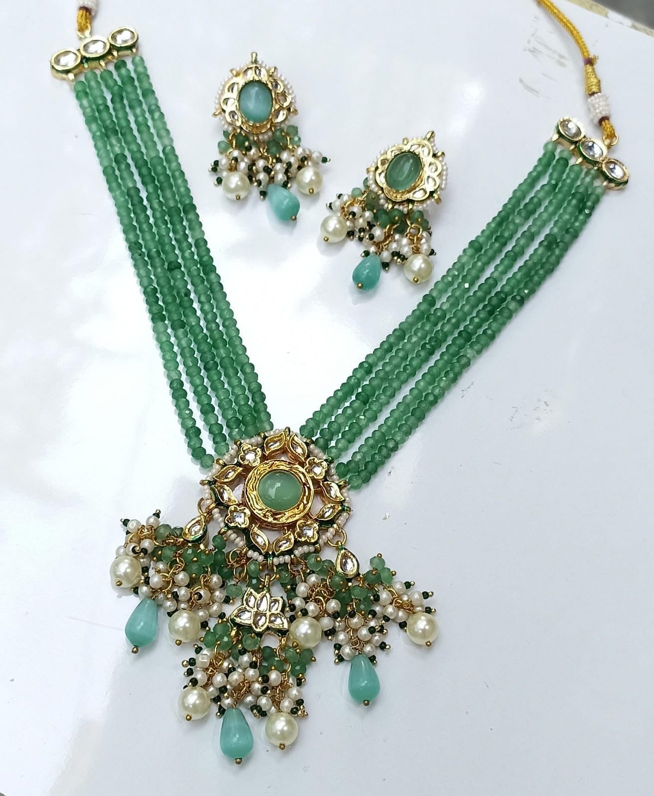 Vrishali Carving Kundan Set