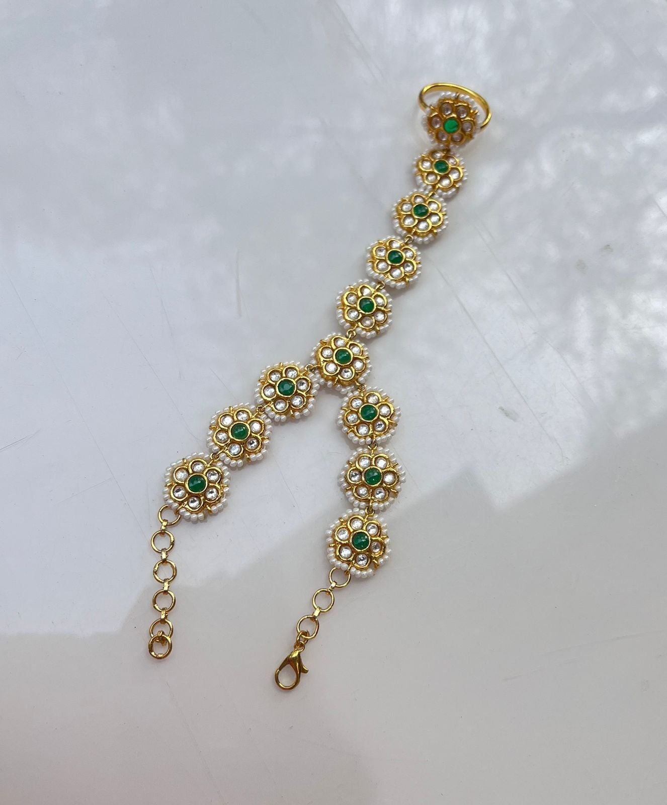 Rea Pachi Kundan Haath Phool